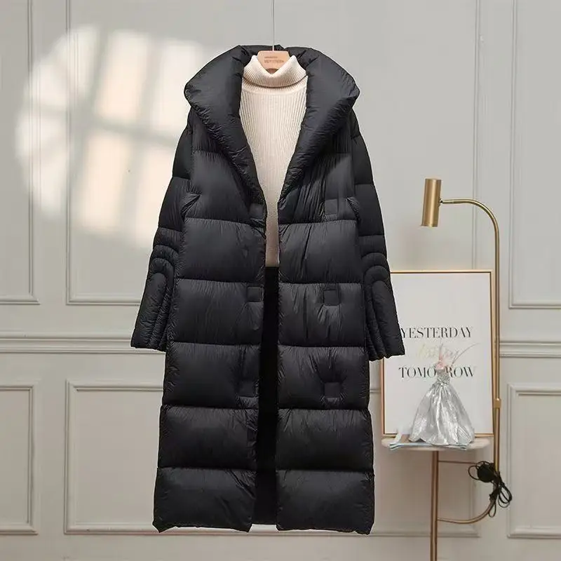 เสื้อแจ็คเก็ตขนเป็ดสีขาวรุ่นใหม่ปี 2025 สำหรับฤดูหนาว เสื้อโค้ทขนเป็ดแบบหนาสไตล์เกาหลี ทรงหลวม แฟชั่น เสื้อพาร์ก้าขนเป็ดยาวสำหรับผู้หญิง