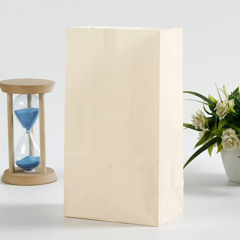 Colored kraft paper gift bag must be made of hand-free candy flat mouth packing bag with square bottom cowhide Paper bag system