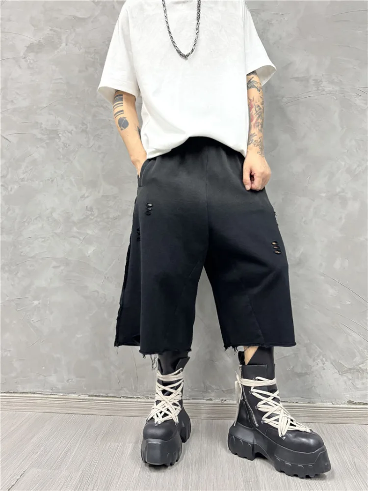 Zware donkere retro gewassen gradiënt gescheurde vrije tijd middenbroek mode trendy losse cropped shorts heren