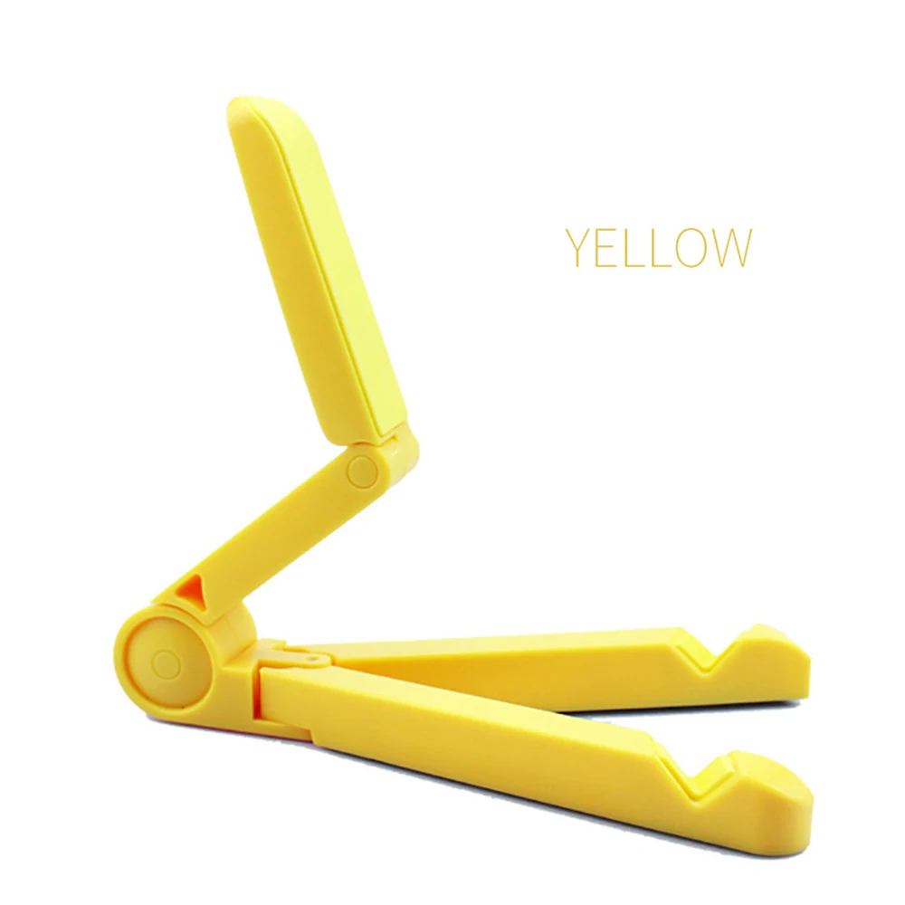 Yellow plastic adjustable foldable phone stand designed for desk use