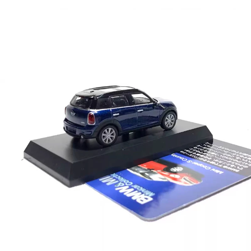 Pressofuso in scala 1:64 Seven MINI Cooper S Countryman Modello in lega Simulazione Prodotto finito Hobby Collezione di souvenir Display
