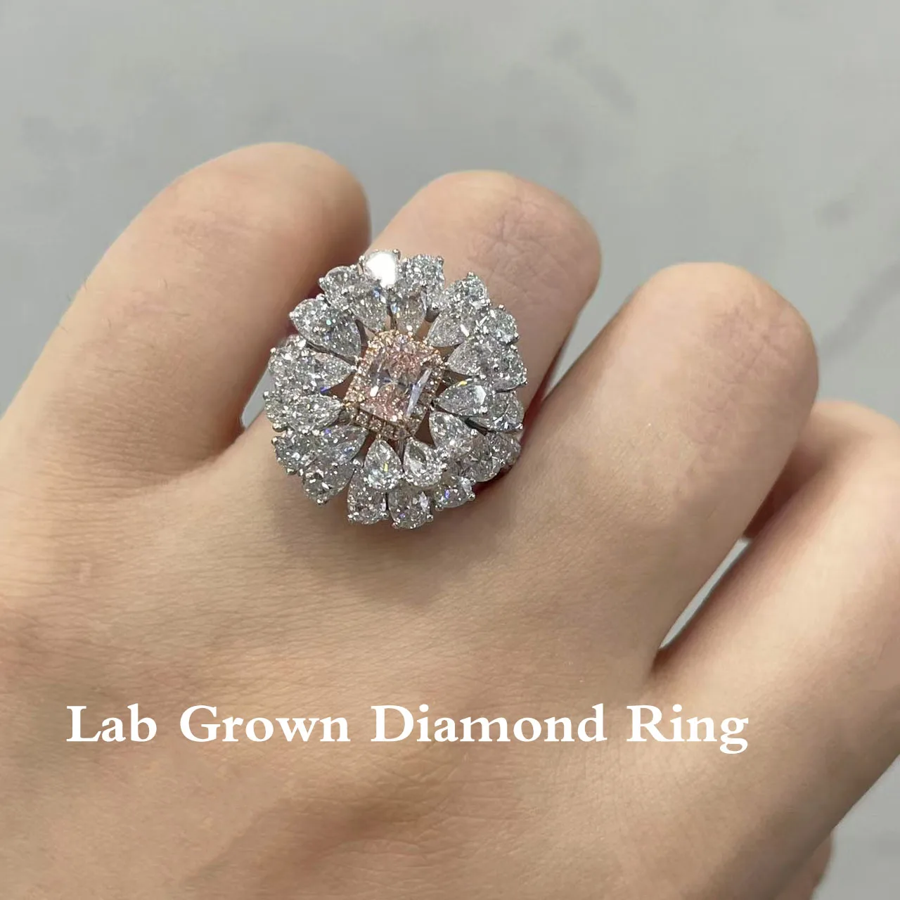 

0.5Ct Fancy Pink Radiant Cut & White Side Stones Pear Cut Round Cut Lab Grown Diamond Ring CVD HPHT NGIC Certificate 14K Color