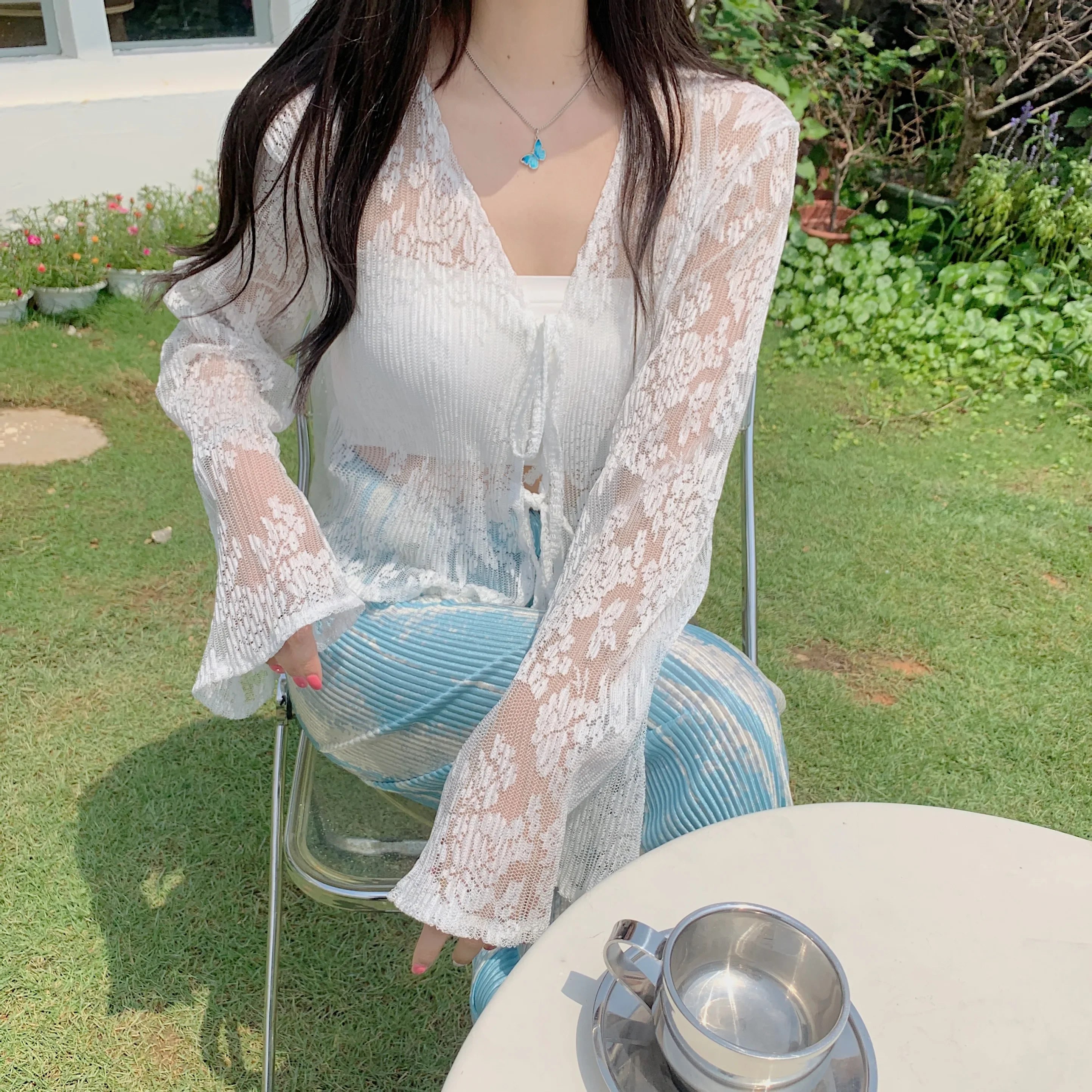 

New V-neck Flare Sleeve Tie Front Crop Tops See Through White Knitted Jackets Female Summer Hollow Cardigan Women 2026 Fashion