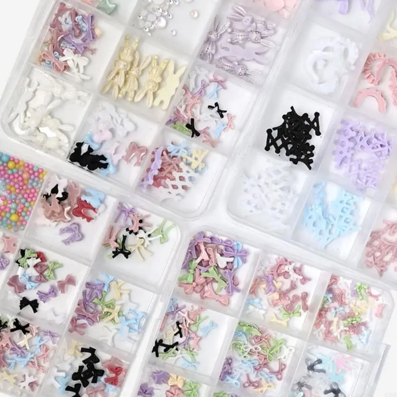G99Eネイルチャームセット、弓蝶のハートネイルアートチャーム、カラフルなネイルアート用品