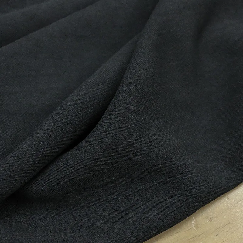 

This is a niche design clothing fabric with simple and elegant style It made of aged tussah silk dirty dyed stir-fried