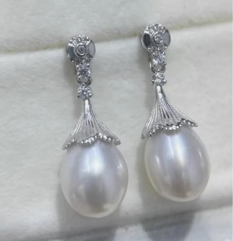 

Классическая пара висячих сережек с белым жемчугом Южного моря диаметром 10–13 мм, 925-х годов