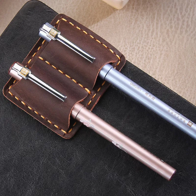 En Stock, Clip doble de cuero Retro para bolígrafo, enchufe portátil para bolígrafo, 2 piezas, nuevo bolígrafo de oficina, Clip de almacenamiento portátil compacto antipérdida