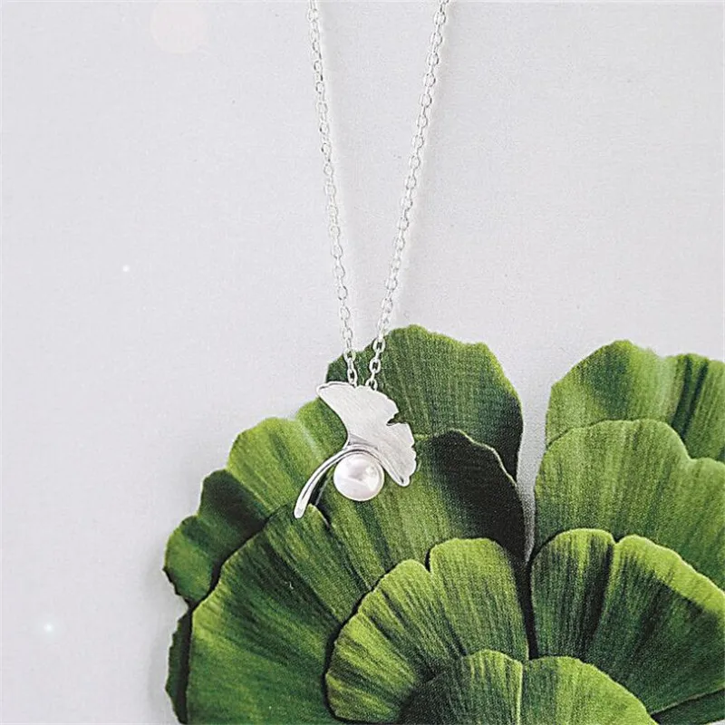 

Оригинальные Популярные креативные серебряные ювелирные изделия, изысканная гинкго билоба жемчужная элегантная простая подвеска, ожерелья HZX299