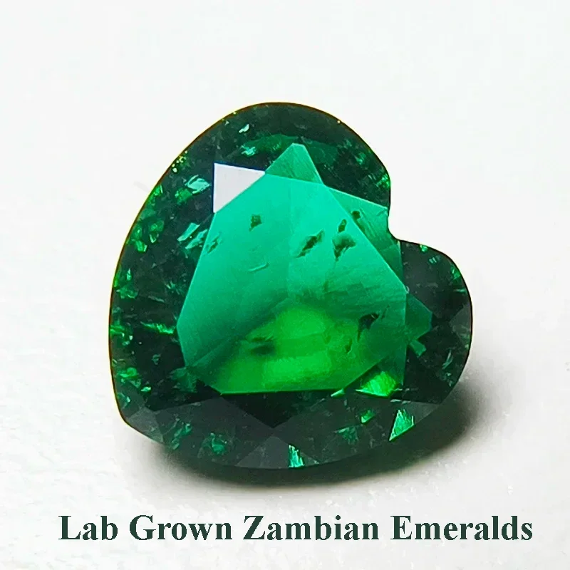 

Lab Grown Zambian Emeralds Hydrothermal Hand Cutting Heart Shape with Cracks Inclusions Inside Selectable AGL Certificate