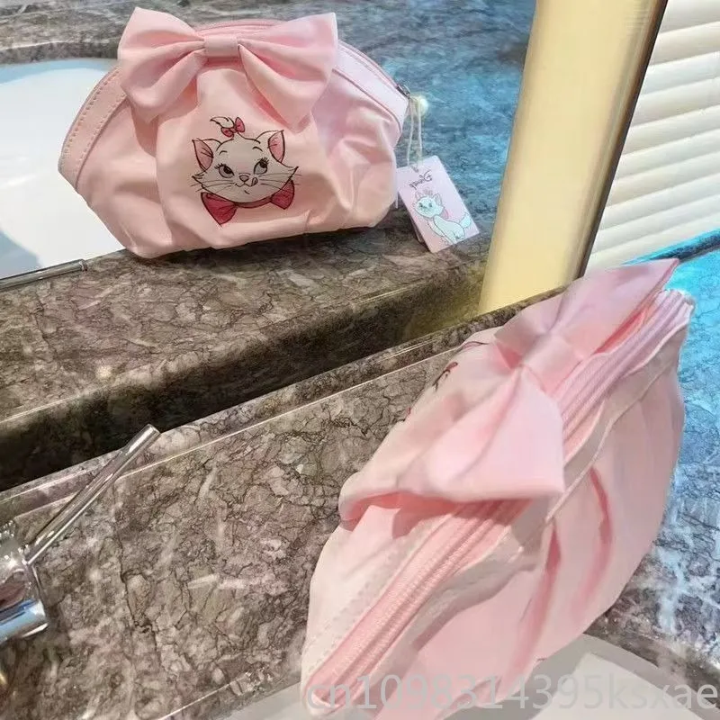 Bolsa de maquillaje de nailon Adorable de Disney, bolso portátil multifuncional, concha de dibujos animados rosa, organizador de cosméticos de tamaño Mini