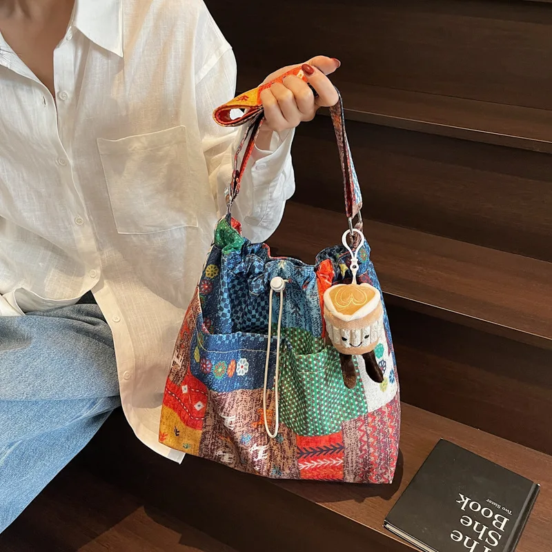 Commuting large capacity clash color draw rope knot mouth ethnic style patchwork bag boho shoulder crossbody bag woman