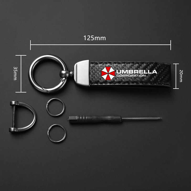 Portachiavi in pelle sintetica effetto fibra di carbonio a tema Umbrella Corporation