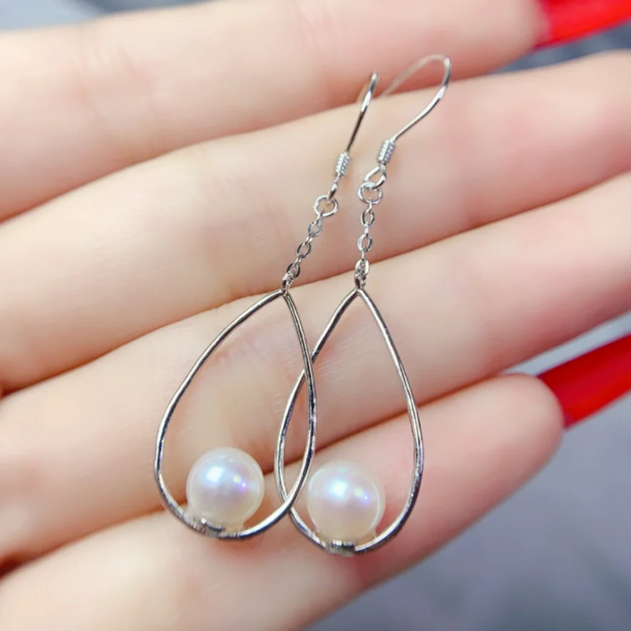 

RARE GENUINE NATURAL PAIR OF WHITE ROUND PEARL EARRING