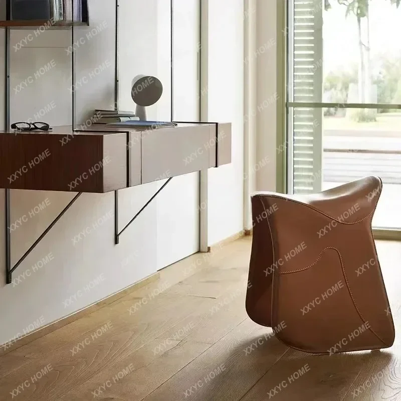 A Nordic Creative Saddle Leather Dressing Stool Model Room Hotel Living Room Personalized Shoe Changing Stool
