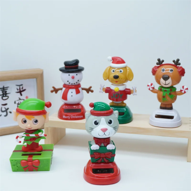 New Cartoon Cute Christmas Snowman Elk Elf Doll Solar Toys Funny Solar Shaking Head Dancing Car Ornament Christmas Birthday Gift