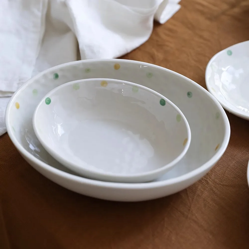 

Export new Japanese fresh underglaze color hand-pinched irregular practical household plates, plates, small bowl sets