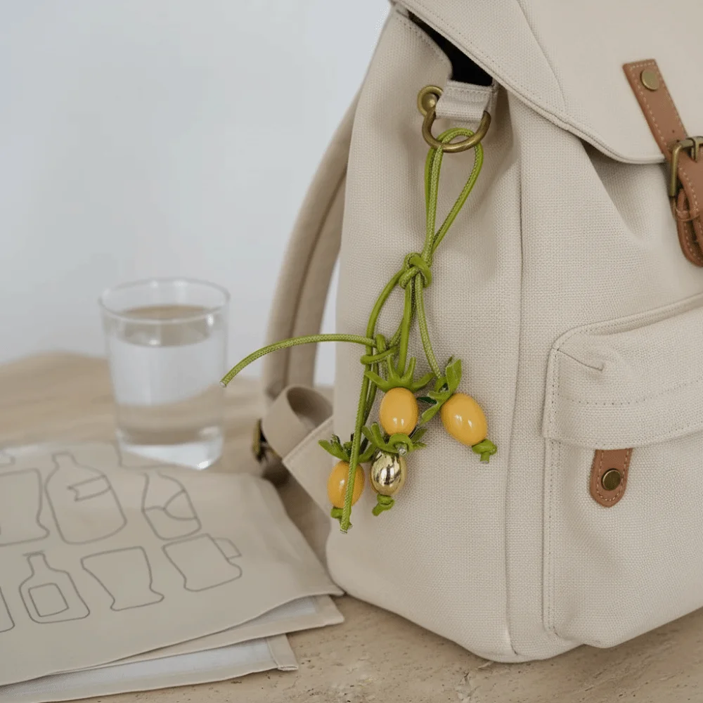 

Изысканный кожаный брелок-подвеска в форме хурмы: элегантный, модный, универсальный, милый аксессуар для сумки и ключей