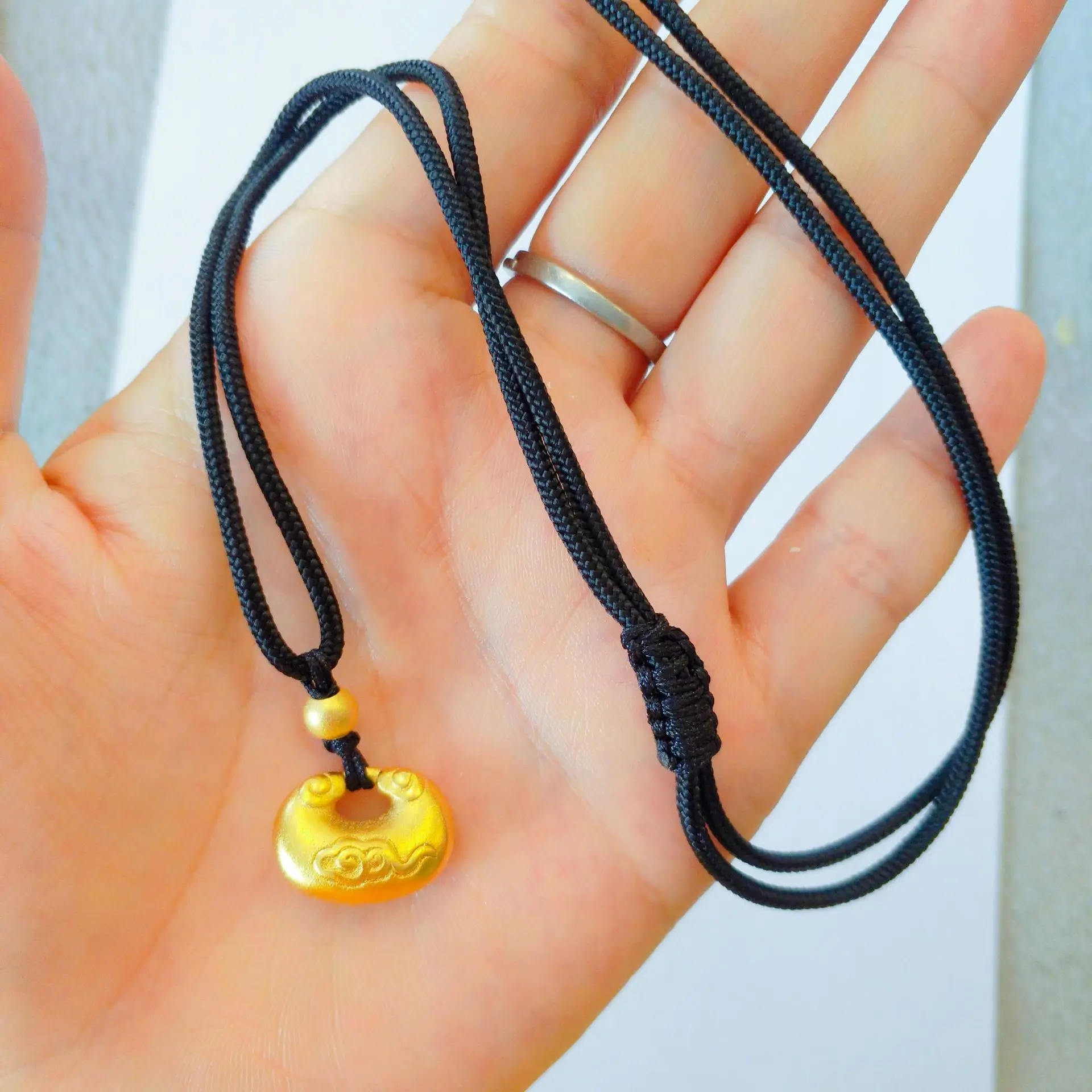 

Xiangyun Xiaojintuo Pendant, women, 24K gold AU999 hollow cloud dumpling, magnetic design to match party shape