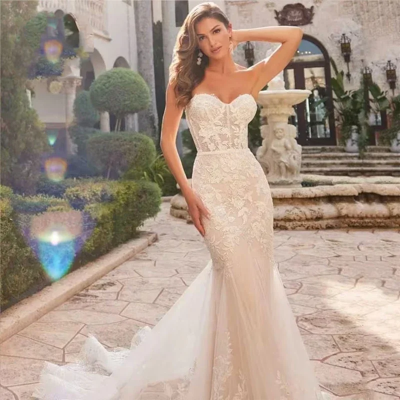 Abiti da sposa personalizzati Sixy a sirena Abiti da sposa senza maniche con applicazioni in pizzo Abiti da sposa con scollo a cuore Abiti da sposa