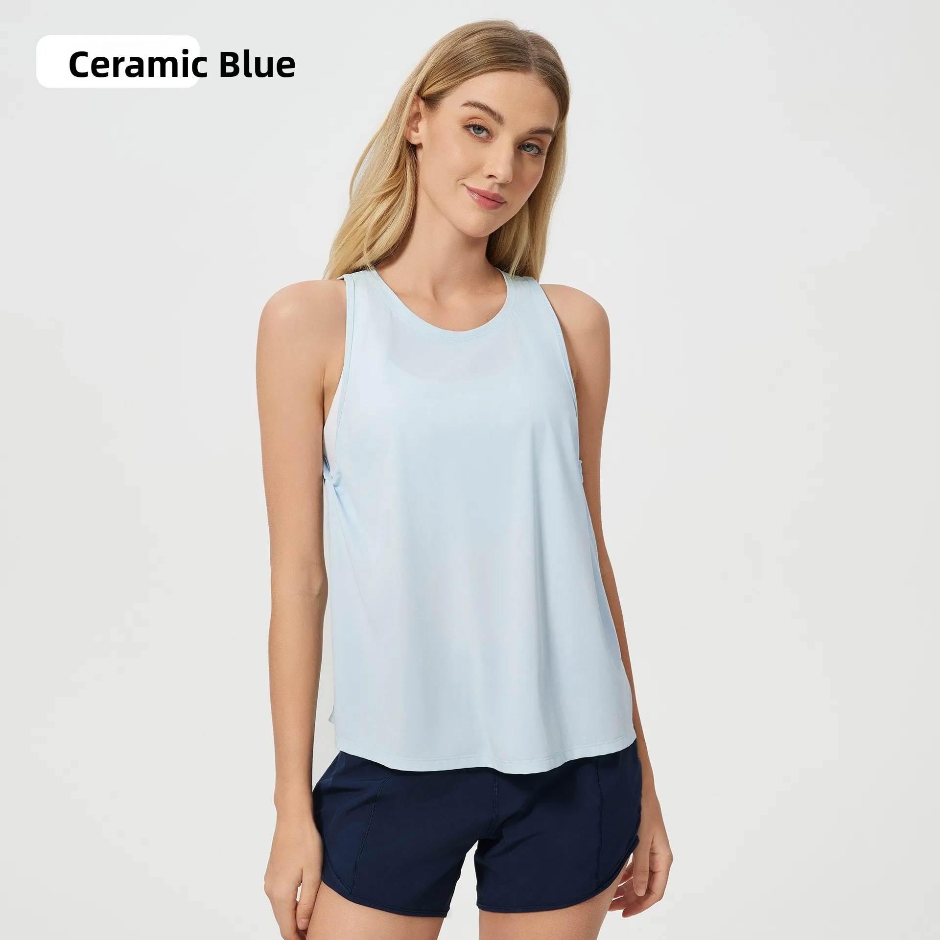 

Lightweight Breathable Yoga Sports Vest Women's Loose Fit Qui Dry Fitn Gym Tank Top Flutton Design Nylon Fabric