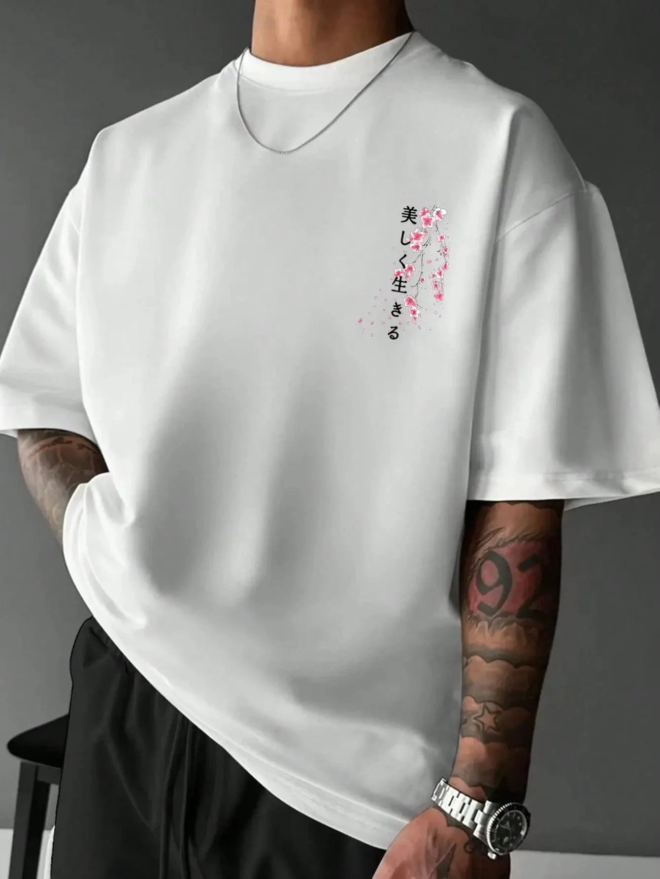 The 2025 summer new men's T-shirt features a casual fashionable comfortable and soft 3D plum blossom pattern print