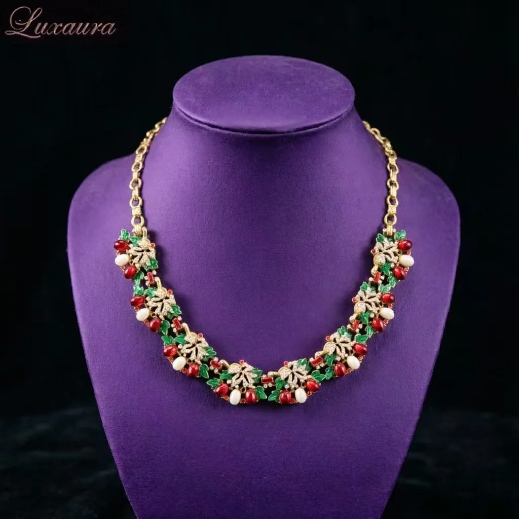 

Vintage jewelry featuring a fashionable and classic gold geometric necklace design paired with Bohemian style women's necklace