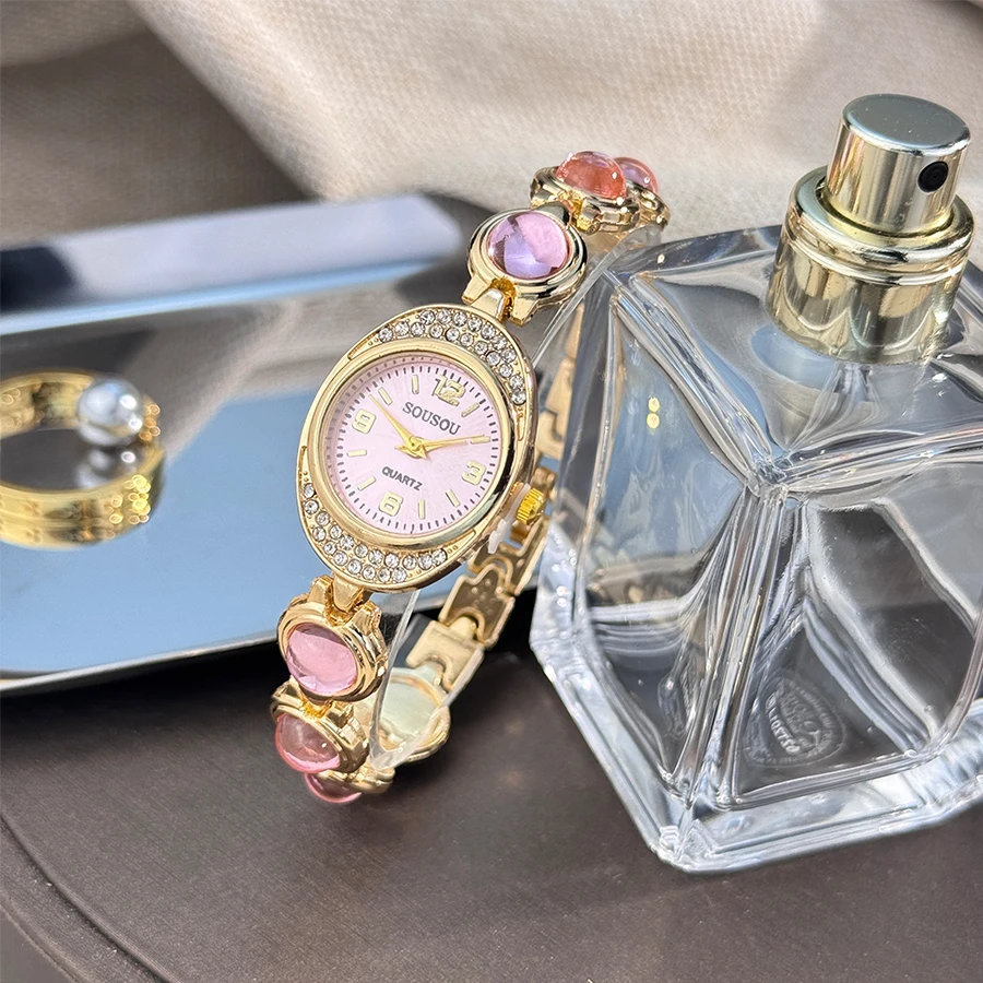A new oval diamond-encrusted case with a shiny and colorful large bead bracelet unique and beautiful quartz watch for women