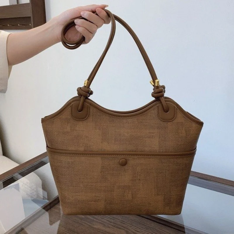 

Elegant Women's Tote Bag Crafted From Soft Leather By Luxury Brand Featuring Famous Designer Signature Style
