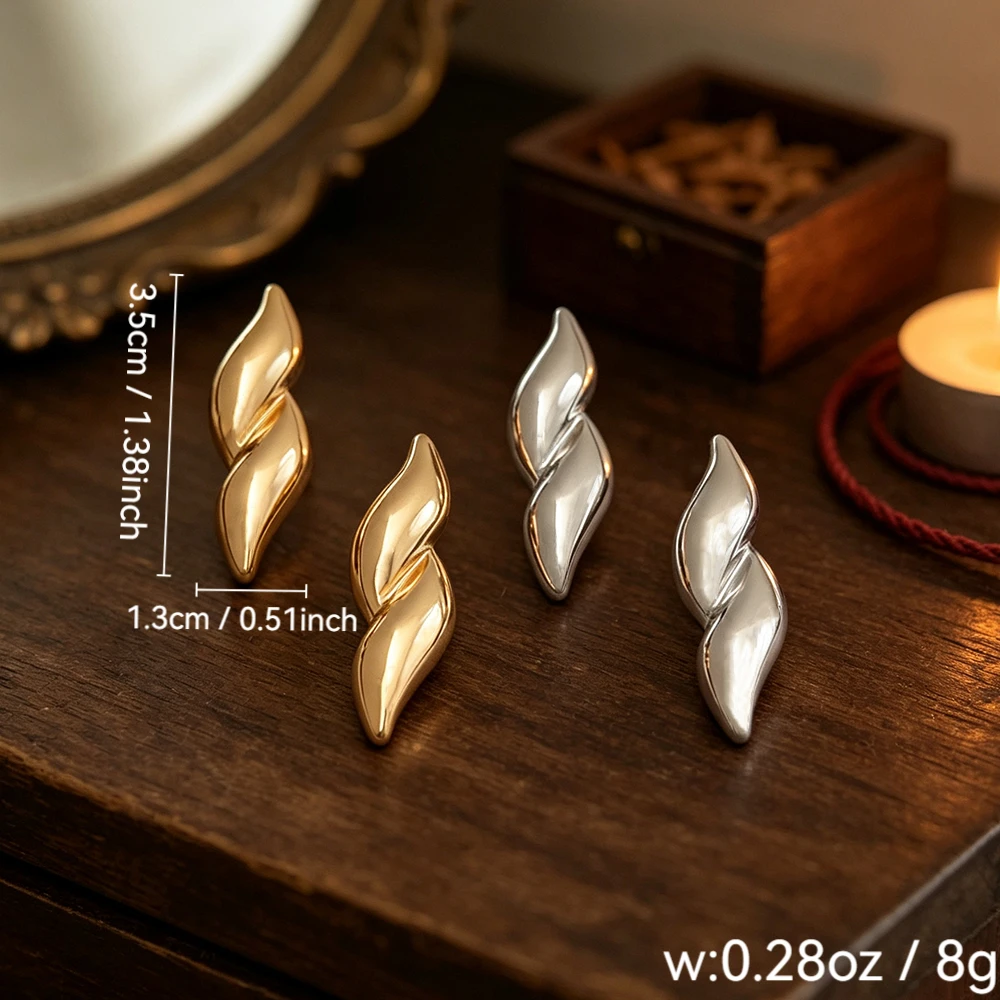 Shiny twisted streamlined metal stud earrings, gold and silver dual-tone vintage high-end versatile geometric women's earrings for commuting