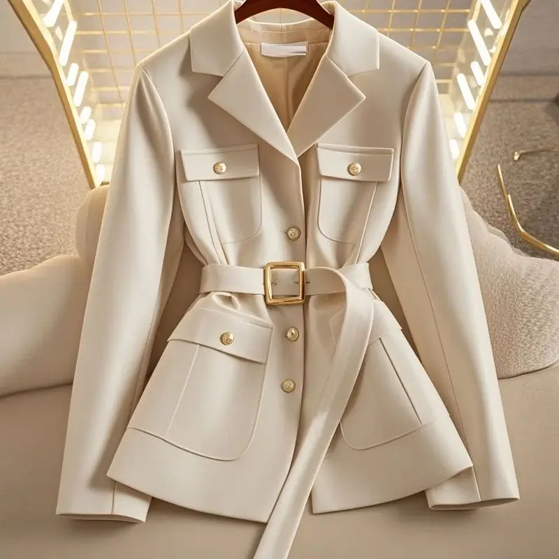 

Early autumn new Xiaoxiangfeng apricot coat female unique super good-looking temperament celebrity high-end waist short top
