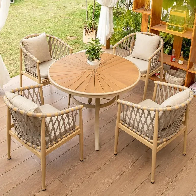 A Nordic outdoor table and chair five-piece combination light luxury one table and two chairs casual tea table