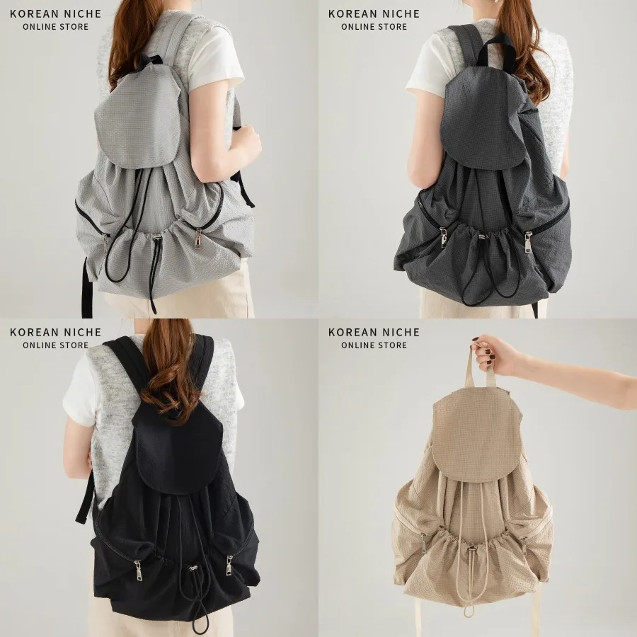

【New style】New Korean style niche design solid color fashionable all-matching light and large capacity backpack women's casual