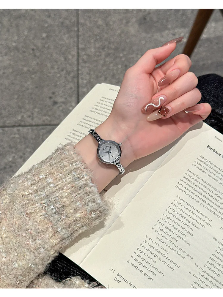 A sophisticated and elegant women's watch with a small dial and minimalist steel strap a new style for 2025Elegant women's watch