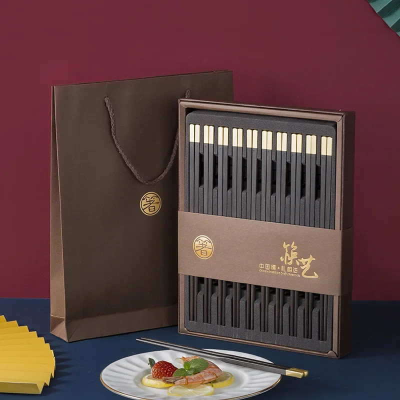 Tableware New ebony chopsticks gold head non-slip high-end gift box Household gifts Moisture-proof new Chinese retro desktop24cm
