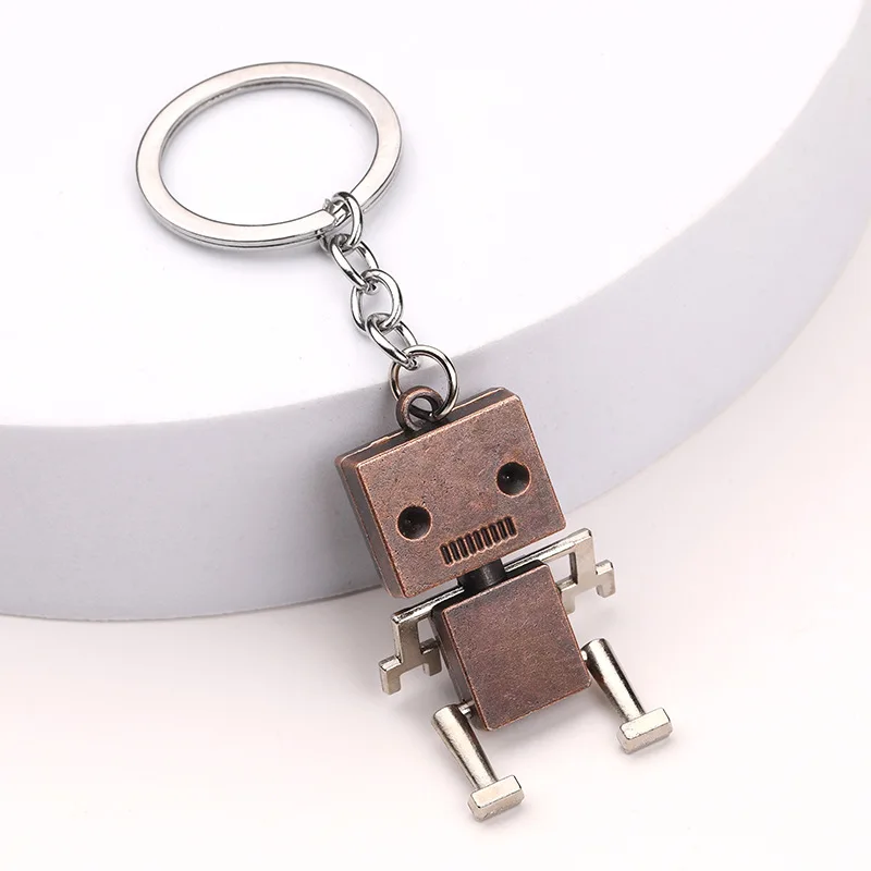 Creatieve beweegbare robot sleutelhanger Retro eenvoudige schattige cartoon hanger sleutelhanger ketting 1/3pc
