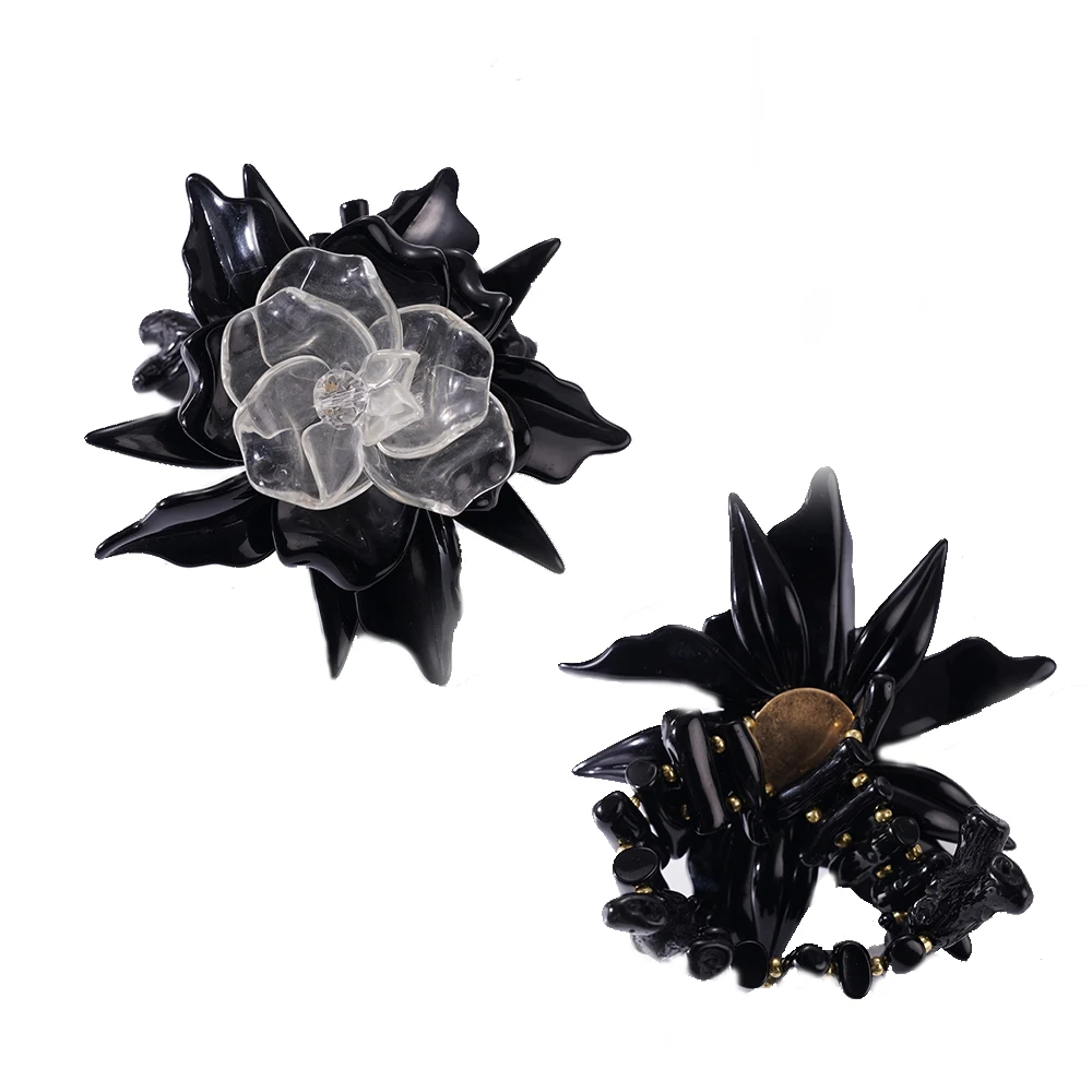 

The European Black Flower Design Bracelet Features Adjustable Elastic Bands That Can Be Worn For Any Occasion