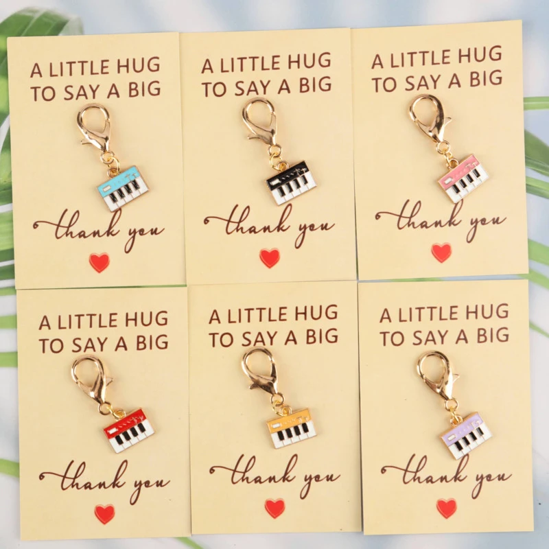 6pcs 2dInteresting Music Series Piano Keychain Set The accompanying music is an ambiance card Actively support gifts Good luck g