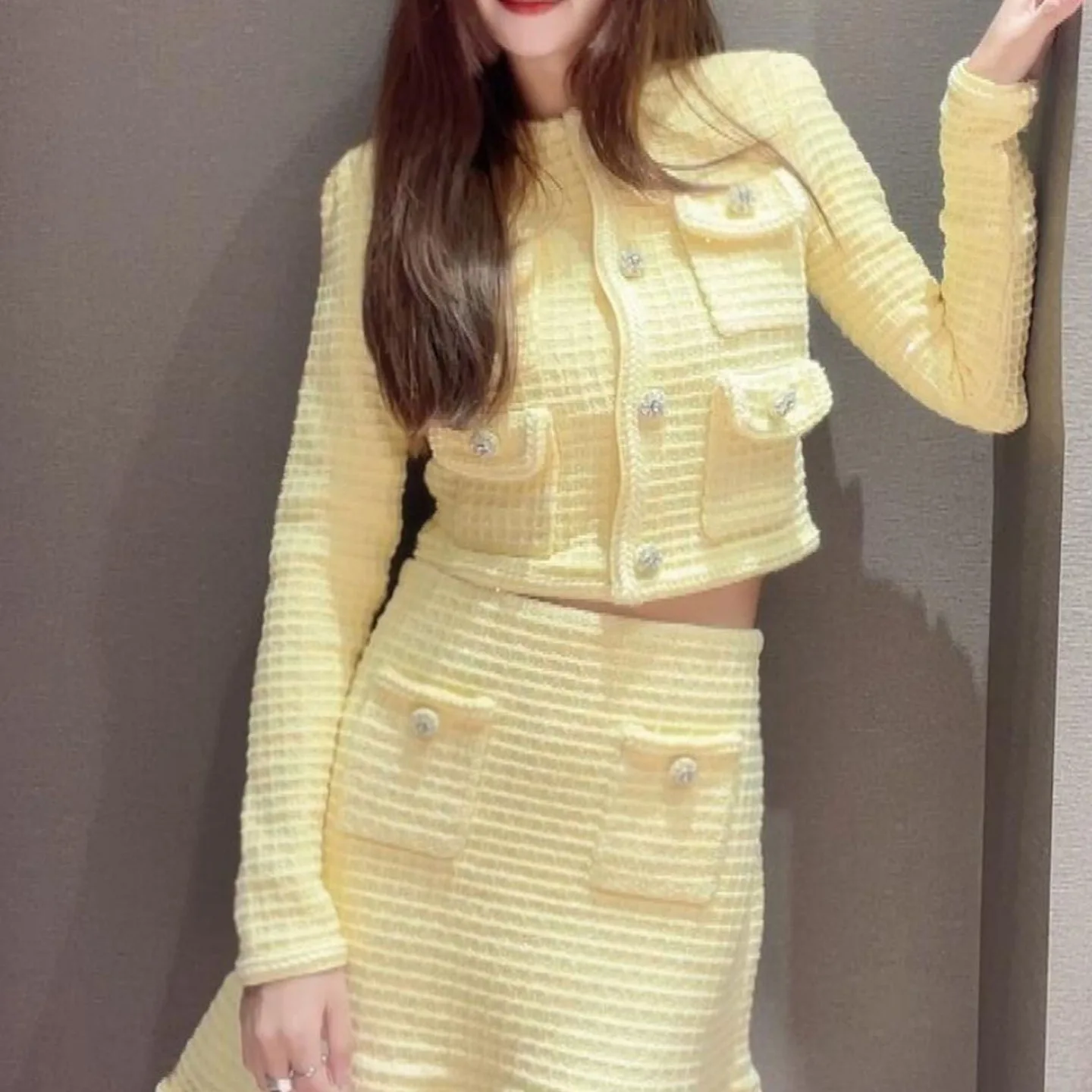 Elegant yellow two-piece suit for office ladies, long-sleeved knitted cardigan or slim-fitting pocket-embellished skirt