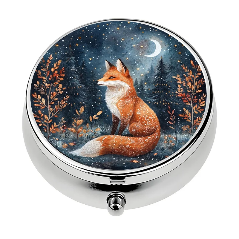 A single portable pill box, divided into three sections, featuring a forest fox and night sky theme design. This mini decorative storage box is a unique gift for keeping vitamins and medication organized