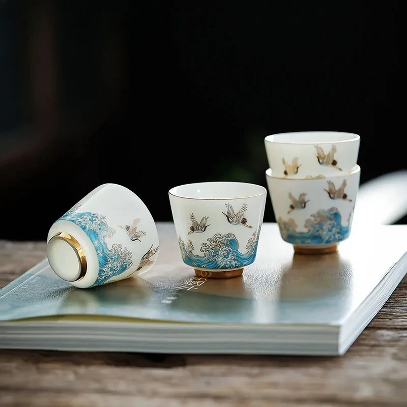 

2pcs /Set 60ml Mutton Fat Jade White Porcelain Auspicious Crane Guanhai Tea Cup Creativity Gold-banded Ceramics Kung Fu Tea Set