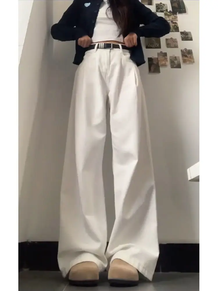 Damskie jeansy proste, marszczone, plisowane, drapowane, z rozcięciem, asymetryczne, palazzo, rozszerzane, dzwony, wydłużające, szykowne.