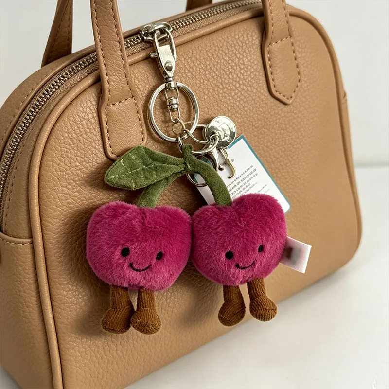 

JC Golf ball plush keychain, grape keychain, jellyfish plush toy, hippopotamus, and plush elephant JC bag keychain
