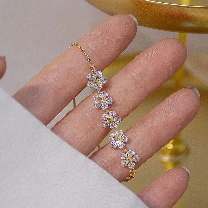 เกาหลีแฟชั่นเครื่องประดับ14KชุบทองแดงฝังAAA Zirconสร้อยข้อมือดอกไม้ยืดปรับสร้อยข้อมือผู้หญิง