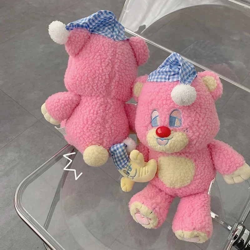 韓国で人気のピンクのクマのぬいぐるみ、アニメの緑の寝間着の帽子をかぶった月の眠っている人形、女の子向けの高品質な紫色のテディベア