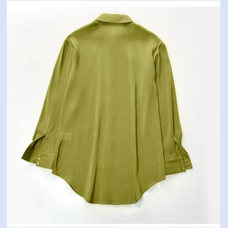 Spain's niche green dyed silk linen loose shoulder mid length shirt