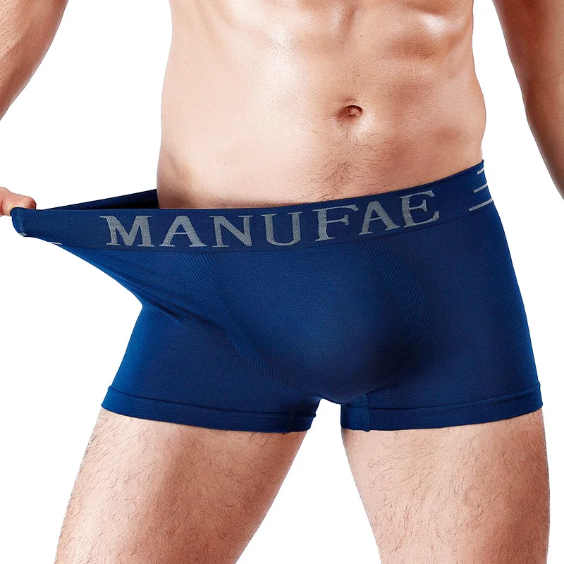 Bóxer cómodo sin costuras para hombre, bragas de estilo japonés de alta elasticidad, pantalones cortos con letras de Color sólido, Boxer suelto