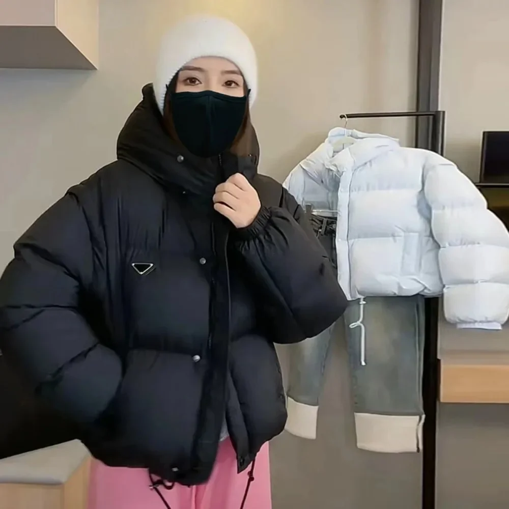 แจ็คเก็ตขนเป็ดของผู้หญิงใหม่ฤดูใบไม้ร่วงและฤดูหนาวเสื้อแจ็คเก็ตมีฮู้ดสองแขนถอดออกได้2024ใหม่เสื้อโค้ทปาร์เกอะร์ลำลองของผู้หญิง