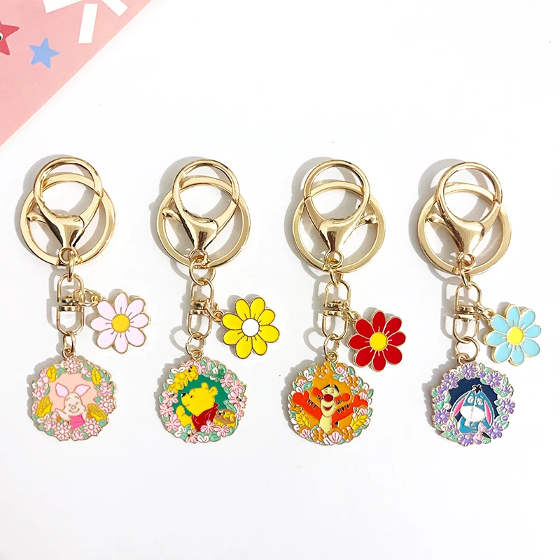 Disney Pooh Bear Piglet Tigger flor corona diseño dibujos animados llavero de Metal bolsa de maquillaje cremallera decoración colgante regalo de cumpleaños