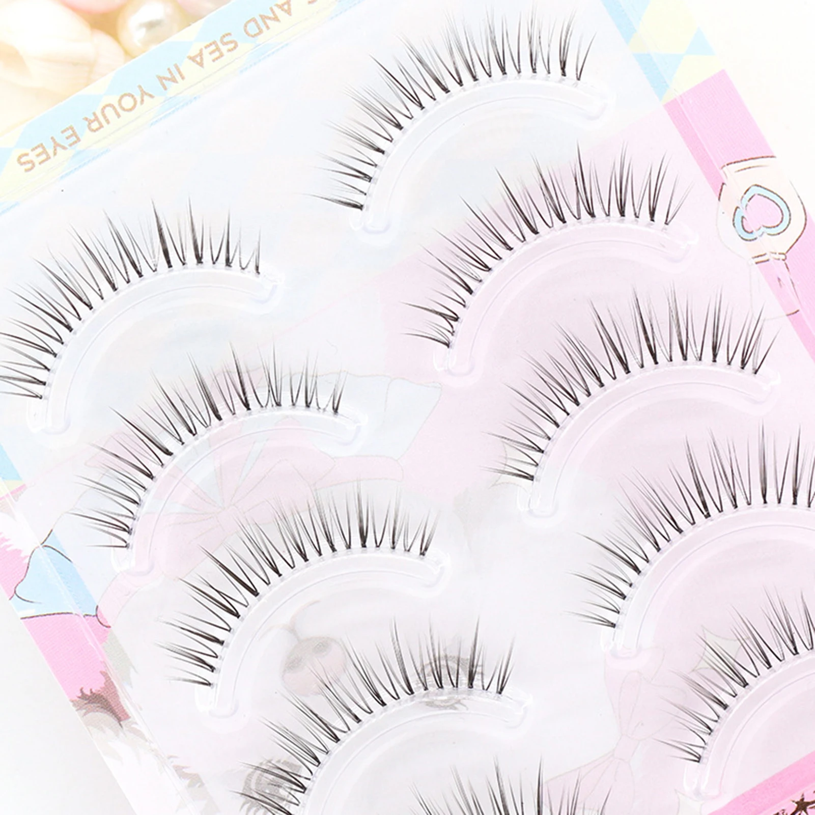Ciglia finte Aspetto naturale Ciglia a striscia completa Ciglia spesse e sottili appuntite quotidiane per effetto sollevamento occhi Strumento per l'uso del trucco fai-da-te