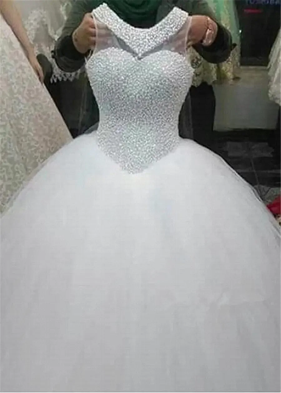 

Customized Hot Selling Luxury Heavy Pearl Beaded Wedding Dresses Sleeveless Plus Size Africa Wedding Bridal Gown